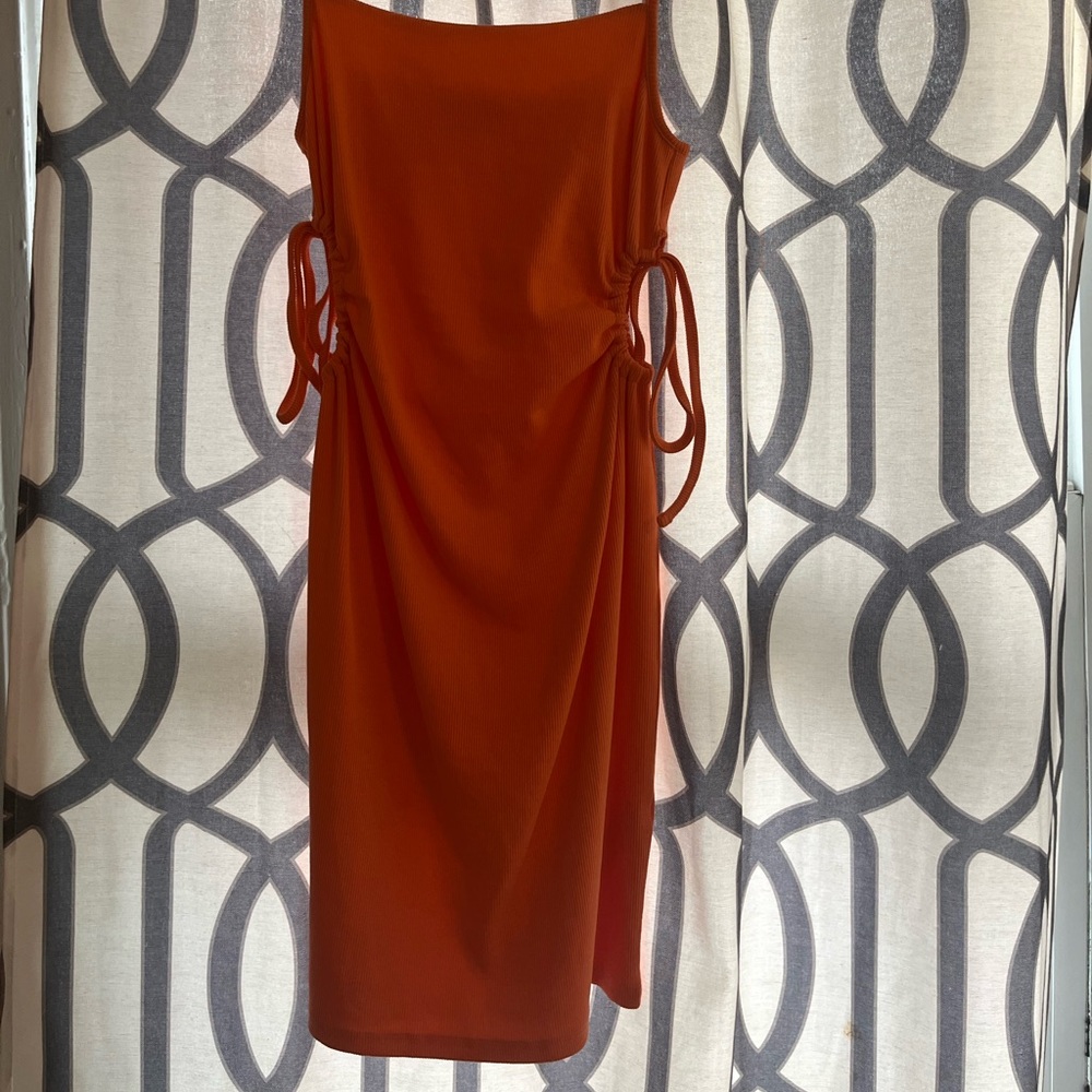 Orange bodycon Zara, mini dress with cut outs.